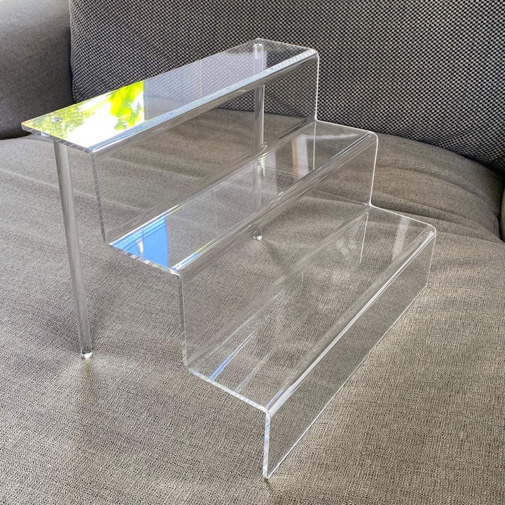 Acrylic display raisers. Used in good condition. 3 available.